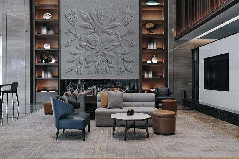 Serene White Floral Stucco Wallpaper Mural shown in a room