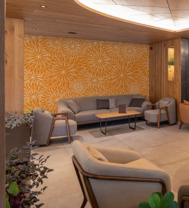 Orange Blossom Tapestry Wallpaper shown in a room