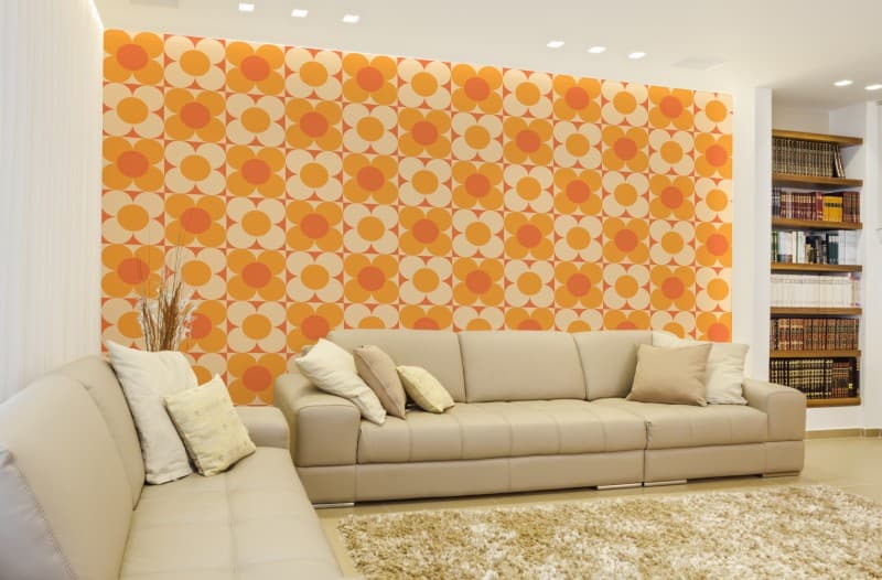 Sun-Kissed Orange Floral Haven Wallpaper Mural shown in a room