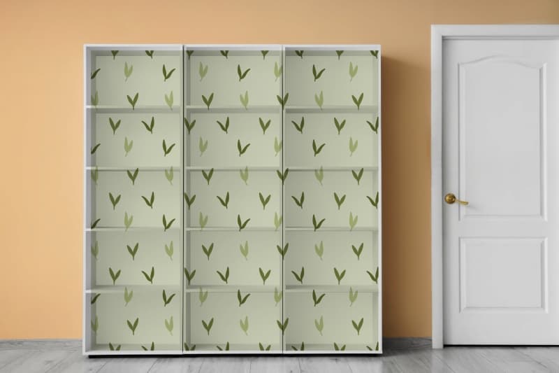 Sprigora, Minimal Leaf Paradise Wallpaper shown in a room