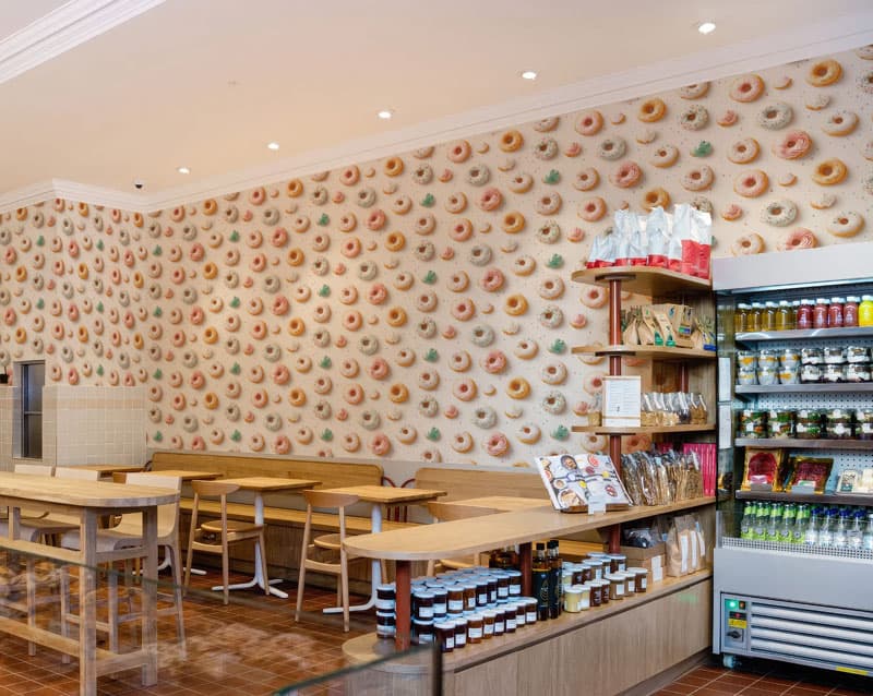 Sweetloop Candy Sprinkle Donut Delight Wallpaper shown in a room