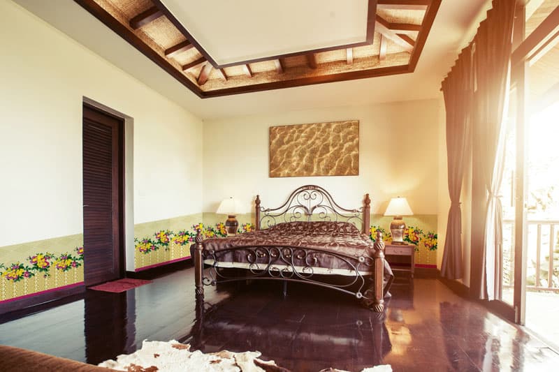Vasantika Phool Bandhai Mural Wallpaper shown in a room