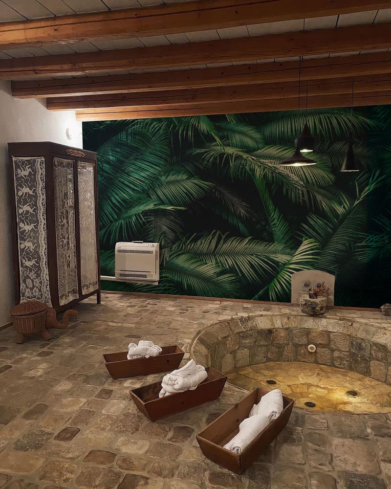 Palmera, Enchanted Green Leaf Mural shown in a room