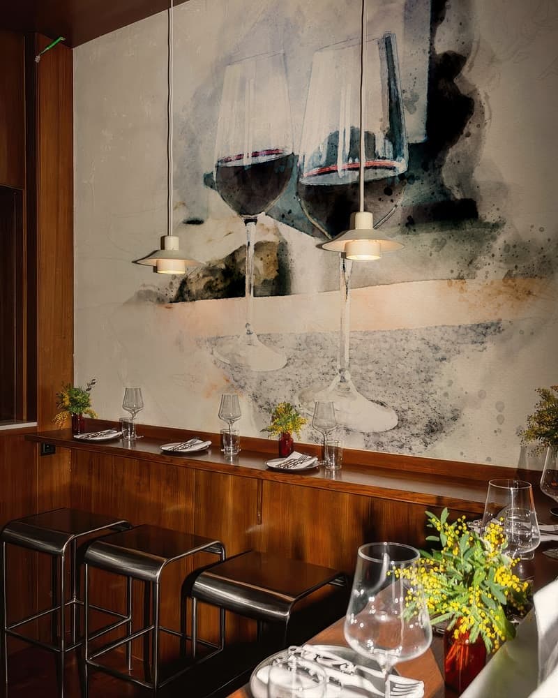 Sanyora Twin Glass Serenity Elegant Wine Art Wallpaper shown in a room