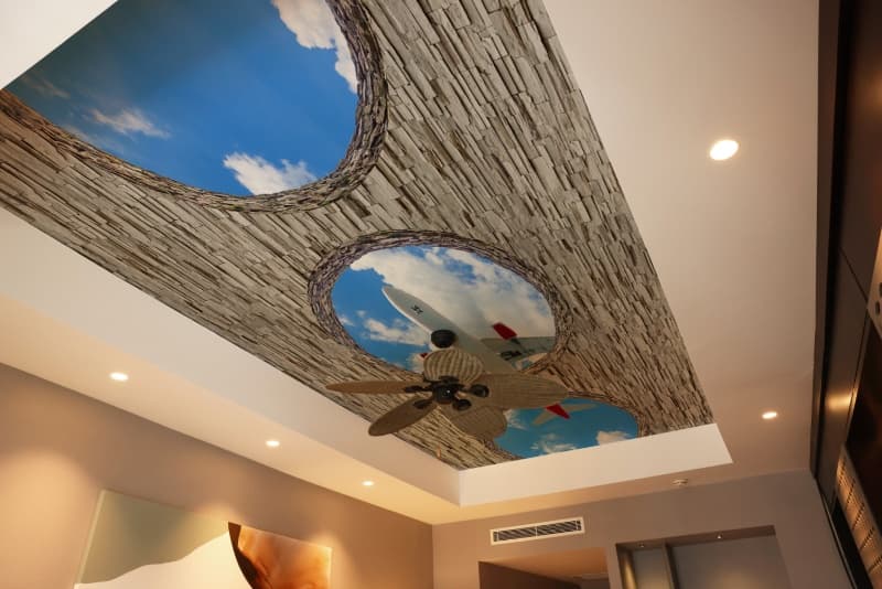Jetwell, Flightscape Windows Ceiling Wallpaper shown in a room