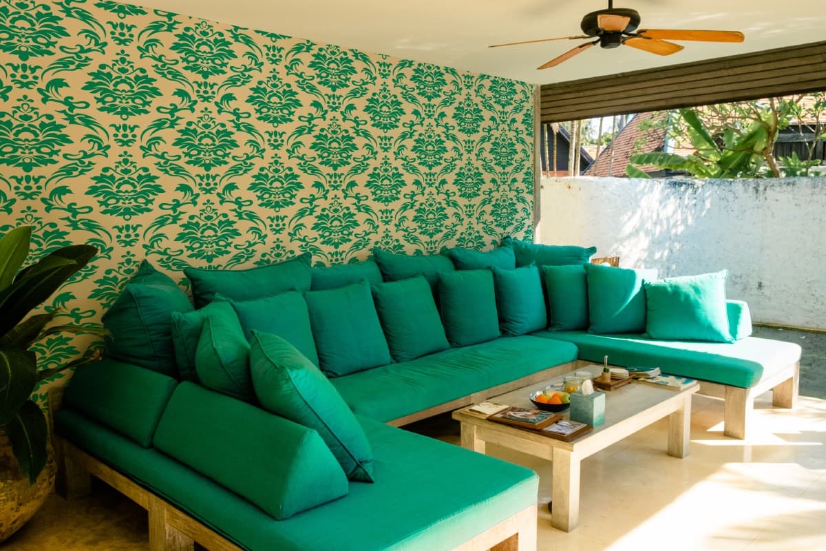 Serin, Emerald Green Damask Elegance Wallpaper shown in a room