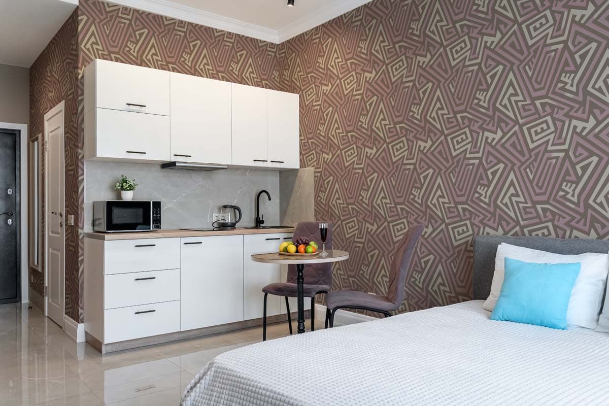 Lavrix, Modern Mauve Line Art Wallpaper shown in a room