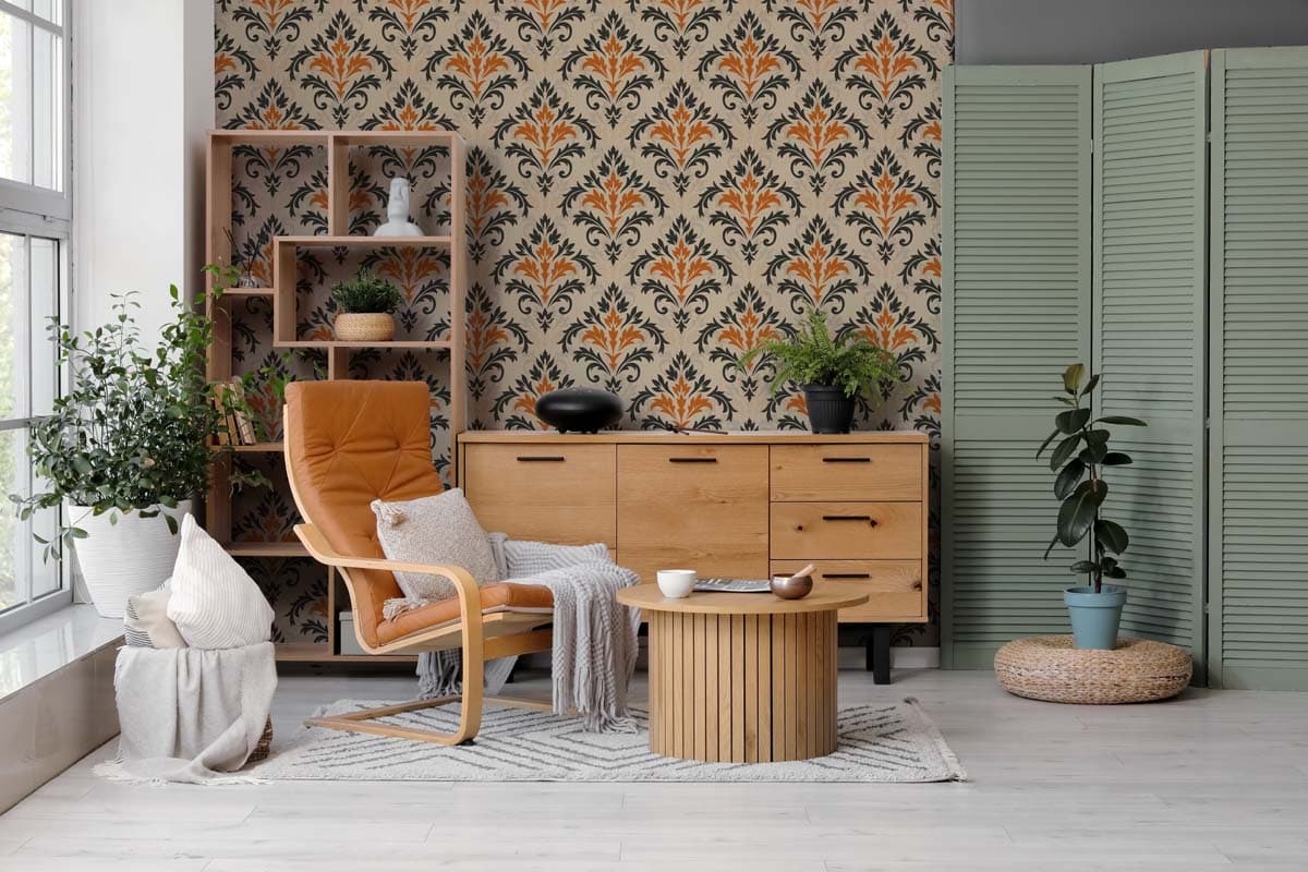 Damaky, Burnt Orange Regal Damask Wallpaper shown in a room