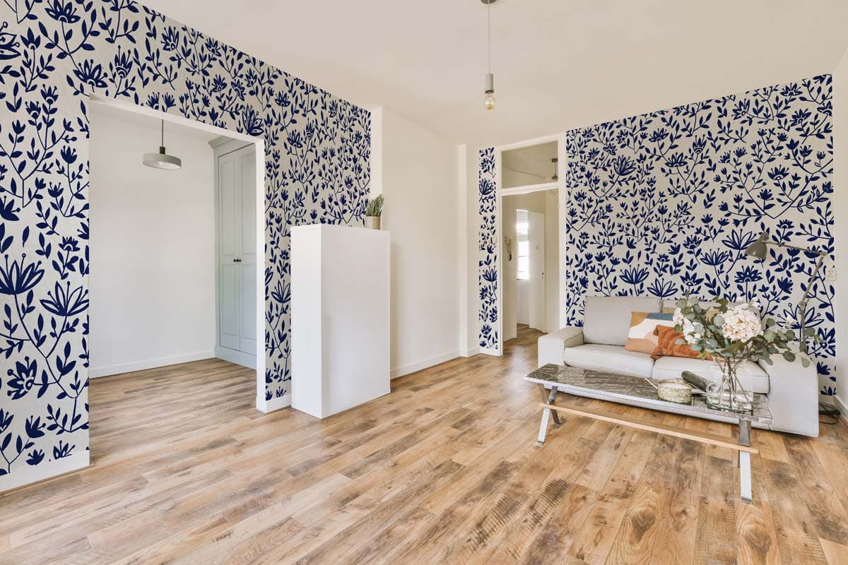 Lunar Bloom, White Folk Floral Wallpaper shown in a room